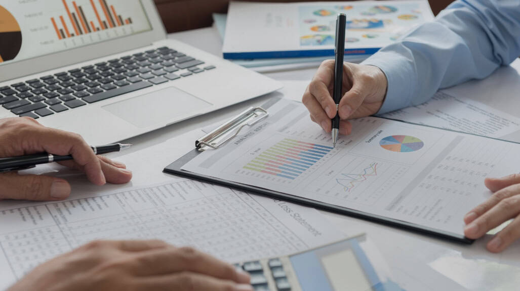 Accountant in Reservoir At Latitude Accountants. Two people working together on accounting tasks